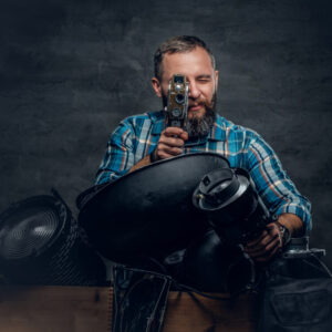 A man videographer in a studio.
